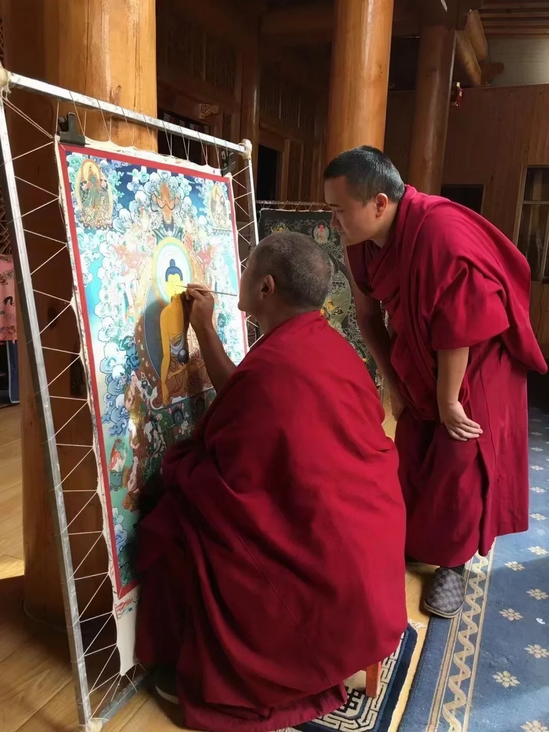 Tibetan thangka artisan at work